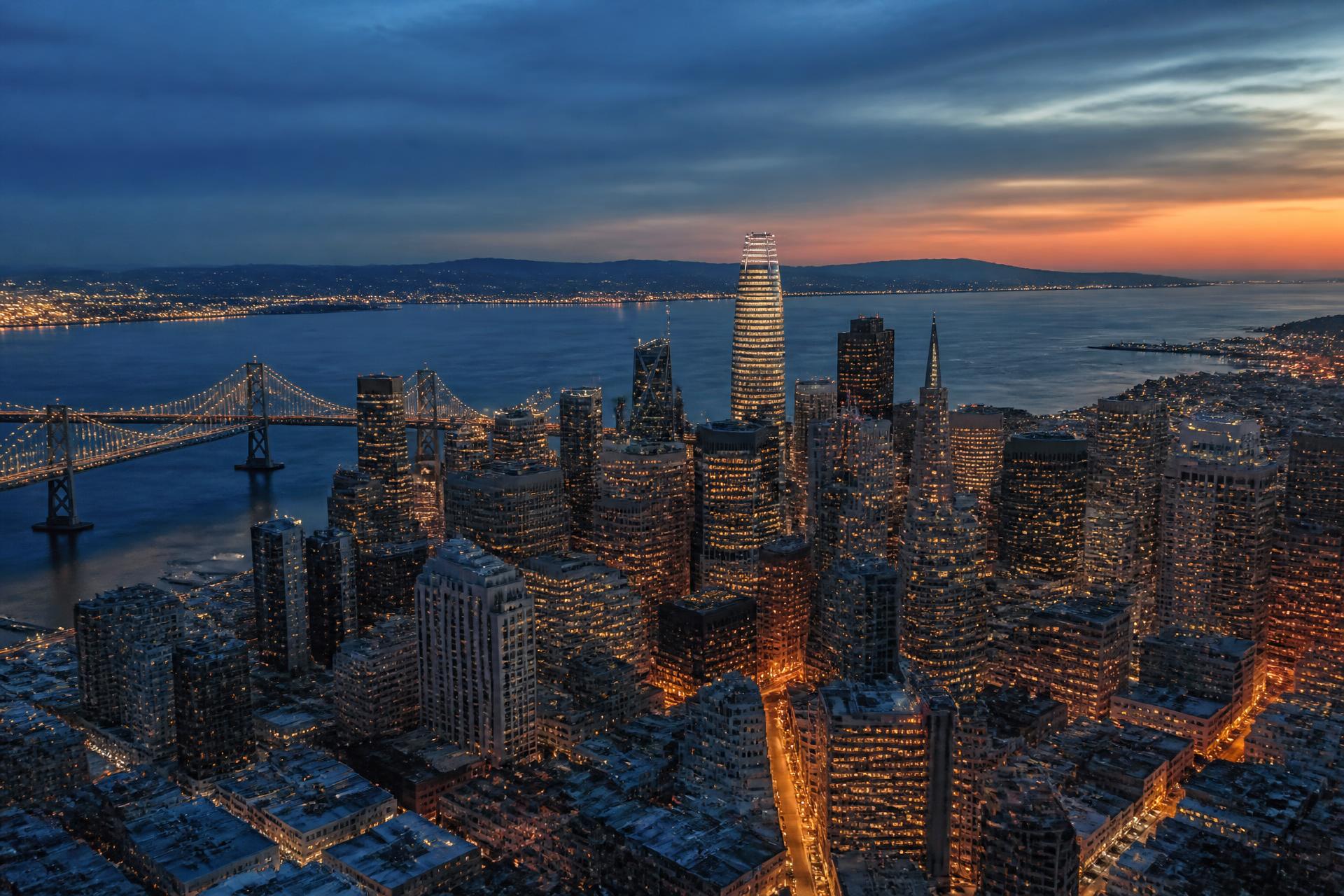 San Francisco skyline at dusk with the Bay Bridge
